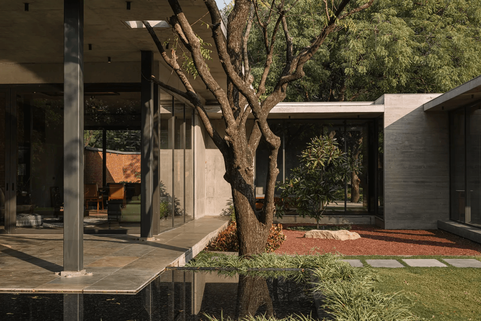 Contemporary Indian home opening onto a leafy courtyard